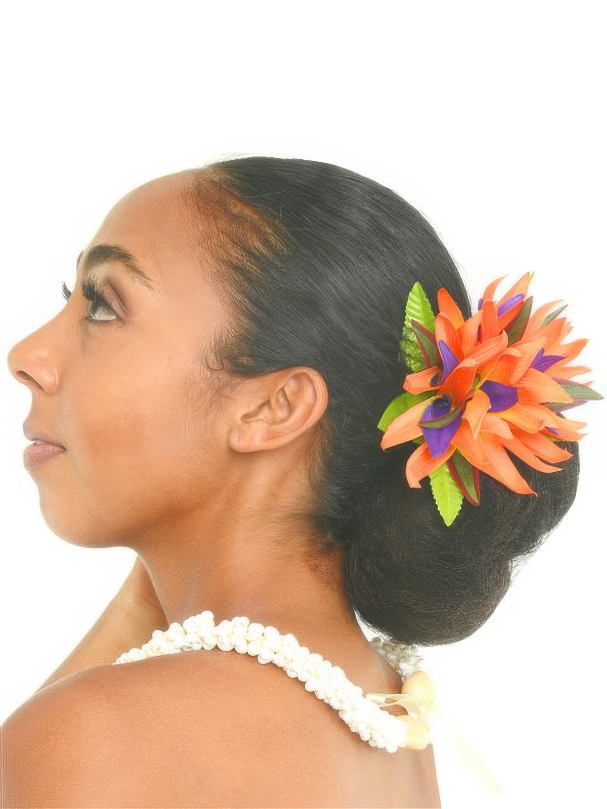 Woman with a floral hair accessory on a white background